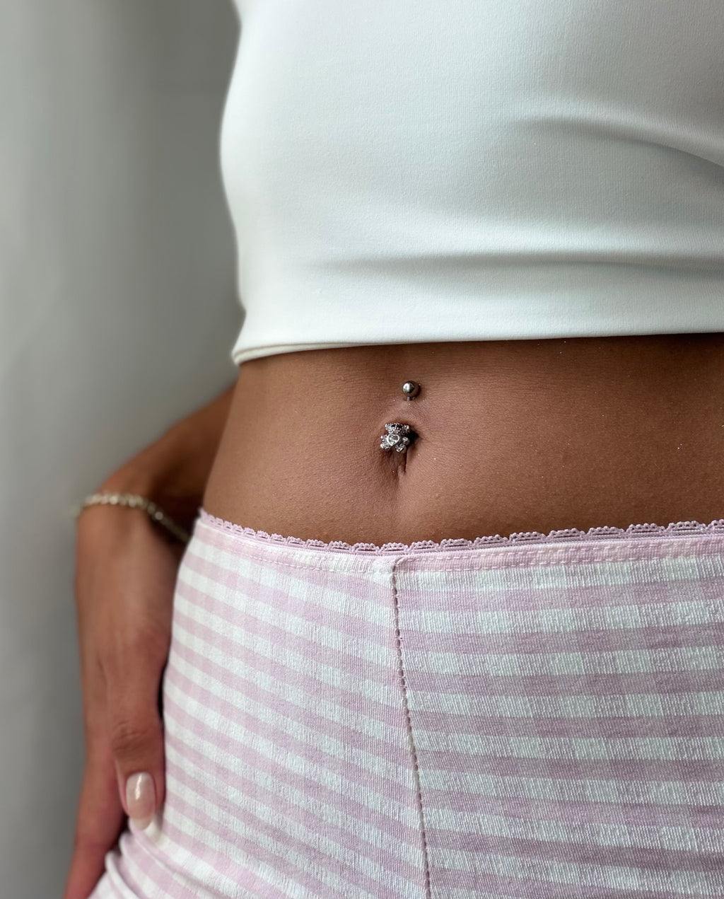 Teddy Sparkle Bauchnabelpiercing
