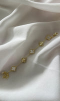 Gold-weißes Kleeblatt Armband mit filigranen Details