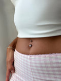 Funkelndes Schneeflocken-Bauchnabelpiercing