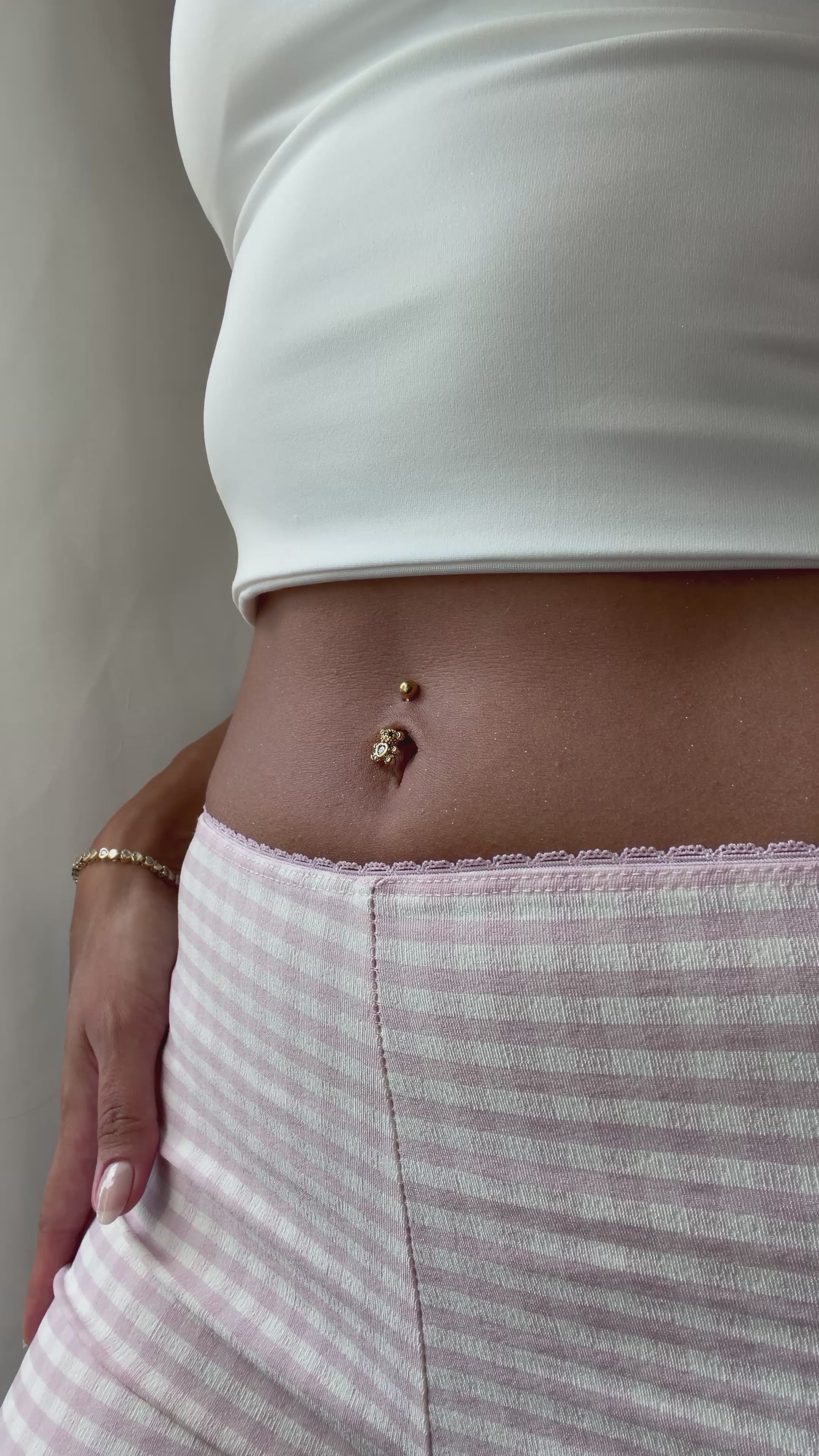 Teddy Sparkle Bauchnabelpiercing